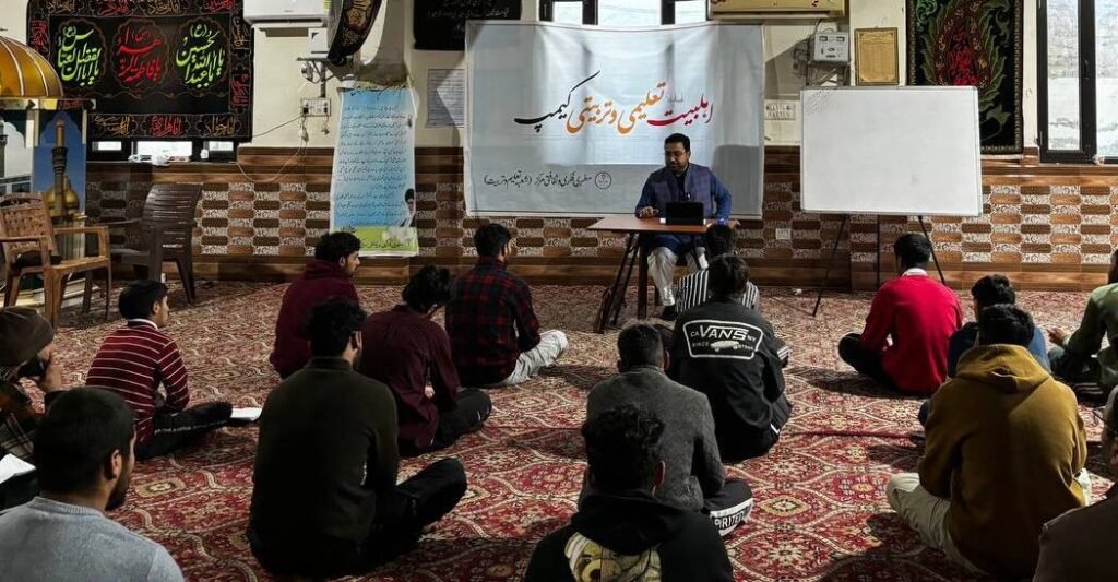 The "Educational and Training Workshop on Ahl al-Bayt (A.S.)" Organized by the Martyr Mutahhari Institute of Kashmir in Jammu General Introduction to the Workshop The "Educational and Training Workshop on Ahl al-Bayt (A.S.)", organized by the Martyr Mutahhari Institute of Kashmir, served as a successful model for religious programs aimed at enhancing religious awareness, fostering social unity, and strengthening moral values in society. The wide participation from various segments of society and the specialized lectures delivered by esteemed scholars turned this program into an exemplary initiative for future religious activities. Continuing such programs can have a profound impact on the community, bringing the younger generation closer to religious and spiritual values. I had the honor of participating as an instructor in this workshop and conducted a class titled "The Human Need for Religion," focusing on the importance of religion in human life and providing practical solutions for expanding religious knowledge. This class lasted for nine hours. Workshop Participants A total of 56 participants from various backgrounds attended the workshop. The attendees included: 1. Government School Teachers – who aimed to enhance their religious knowledge and transmit it to their students. 2. Government Employees – who participated to gain a better understanding of the role of religion in society. 3. Religious Students and Scholars – who sought deeper insights into religious teachings and theological discussions. This diversity of participants highlighted the wide-reaching impact of the program across different sections of society. Instructors and Speakers To ensure the successful execution of the workshop, a number of prominent and experienced scholars participated, delivering daily lectures and addressing specific sessions on religious topics. The main instructors, who conducted daily lectures, included: 1. Hujjat al-Islam wal-Muslimeen Manzoor 2. Hujjat al-Islam wal-Muslimeen Muhammad Jan 3. Hujjat al-Islam wal-Muslimeen Bashir Bhutto 4. Hujjat al-Islam wal-Muslimeen Iqbal Hussain Mir Additionally, nine other scholars participated as guest speakers, addressing specialized topics throughout the workshop. Workshop Closing Ceremony The closing ceremony of the workshop was held in the presence of distinguished personalities and benefactors, adding a special significance to the program. The key details of the closing event are as follows: 1. Presence of Notable Figures and Benefactors More than 20 distinguished personalities from Kashmir and philanthropists attended the closing session. These individuals are key supporters of the Martyr Mutahhari Institute and actively contribute financially and morally to religious programs in the region. 2. Participation of the Faithful from Jammu A group of believers from Jammu also attended the event, expressing their keen interest in the continuation of such programs in the future. 3. Speech by Hujjat al-Islam wal-Muslimeen Ghulam Hussain Matoo The closing ceremony featured a thought-provoking speech by Hujjat al-Islam wal-Muslimeen Ghulam Hussain Matoo, in which he emphasized: • The importance of religion in human life • The role of religion in shaping moral and social structures • The necessity of expanding such educational and religious programs 4. Reception and Dinner At the end of the ceremony, the participants were served dinner in a warm and friendly atmosphere, providing an opportunity for dialogue and interaction among attendees. Workshop Achievements This workshop successfully influenced both participants and the broader community in various ways: 1. Strengthening Religious Knowledge Participants gained a deeper understanding of the importance of religion in daily life and learned practical applications of the teachings of Ahl al-Bayt (A.S.) for addressing contemporary issues. 2. Creating a Platform for Intellectual Exchange The workshop provided a dynamic space for teachers, students, and government employees to engage in meaningful discussions, sharing their views on the role of religion in society. 3. Promoting Unity and Solidarity The broad participation from various sectors of society demonstrated a strong message of unity and collective commitment toward shared religious values. 4. Encouraging Philanthropic Support The involvement of benefactors highlighted the significance of such educational and religious activities and encouraged financial and moral support for future initiatives. 5. Spreading Ethical and Spiritual Values The religious teachings imparted during the workshop helped participants strengthen their moral and spiritual outlook, contributing to a more ethical and faith-driven society. This workshop stood out as a meaningful and impactful initiative, setting a benchmark for future educational and religious programs in the region.